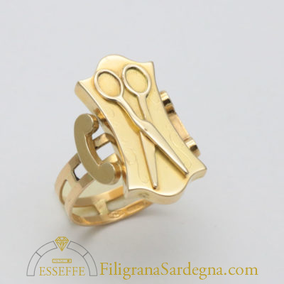 Anello d’oro con forbici