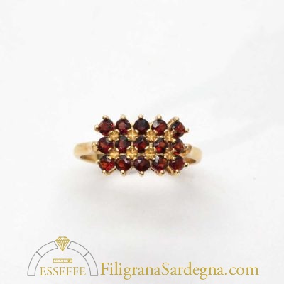 Anello con granati in oro giallo