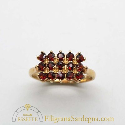 Anello con granati in oro giallo