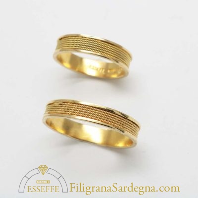 Anello in filigrana d'oro giallo o rodiato