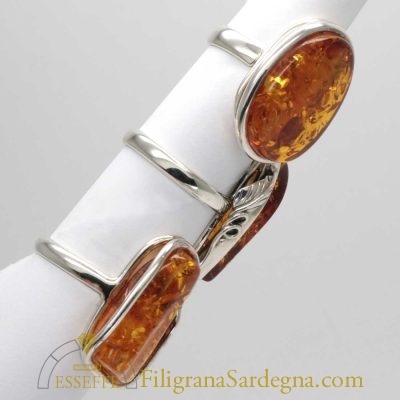 Anello regolabile in argento con ambra
