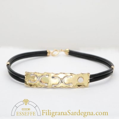 Bracciale bambino in oro con petroglifi