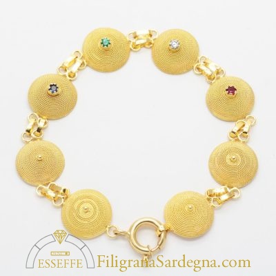 Bracciale con corbule e pietre preziose filigrana