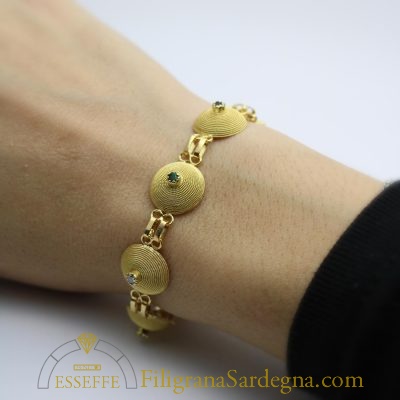 Bracciale con corbule e pietre preziose