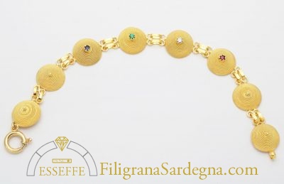 Bracciale con corbule e pietre preziose filigrana