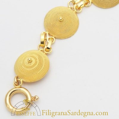 Bracciale con corbule e pietre preziose