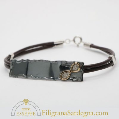 Bracciale con lastra brunita e ionfinito in or