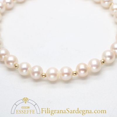 Bracciale con perle bianche