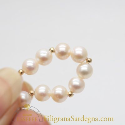 Bracciale con perle bianche