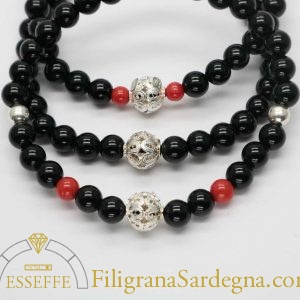 Bracciale con sfere d’onice corallo e vago in filigrana