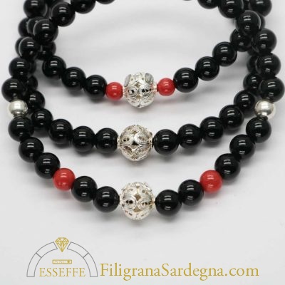 Bracciale con sfere d’onice corallo e vago in filigrana