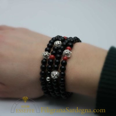 Bracciale con sfere d’onice corallo e vago in filigrana
