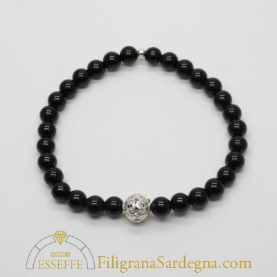 Bracciale con sfere d'onice corallo e vago in filigrana