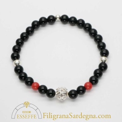 Bracciale con sfere d'onice corallo e vago in filigrana