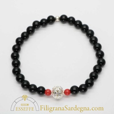 Bracciale con sfere d'onice corallo e vago in filigrana