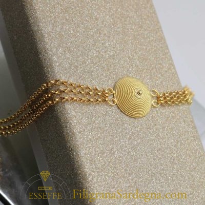 Bracciale d'oro con corbula