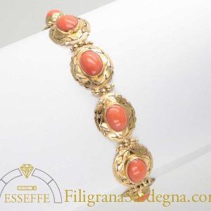 Bracciale d'oro lavorato a bulino con corallo salmone