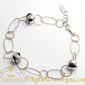 Bracciale in oro bianco e rosé con intercalari satinati e lucidi