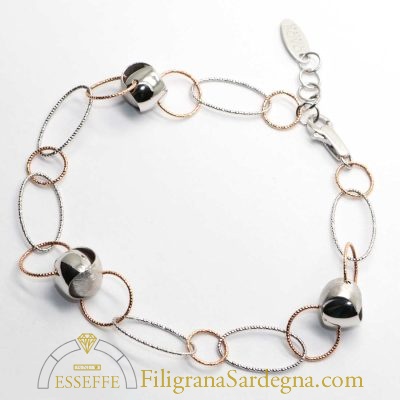 Bracciale in oro bianco e rosé con intercalari satinati e lucidi