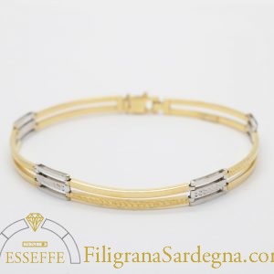 Bracciale in oro giallo e bianco