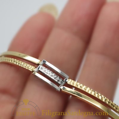 Bracciale in oro giallo e bianco