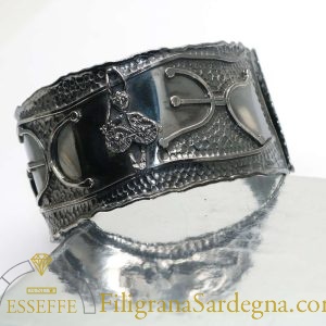 Bracciale rigido in argento con bronzetto