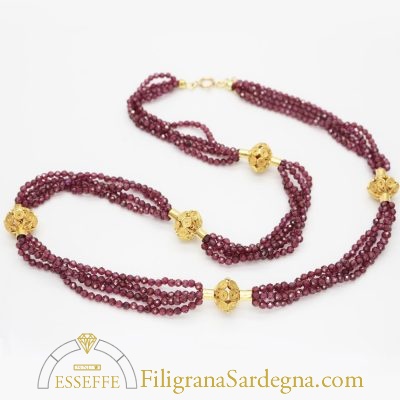 Collana con vaghi in filigrana d’oro e granati