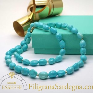 Collana di turchesi naturali a sasso con piccoli intercalari d’oro