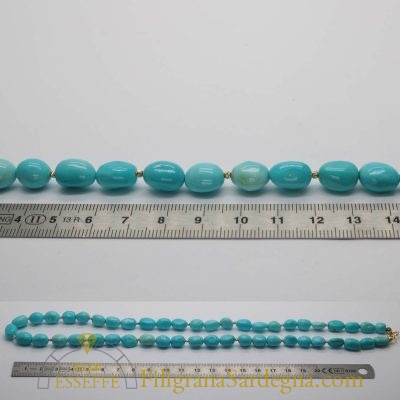 Collana di turchesi naturali a sasso con piccoli intercalari d’oro
