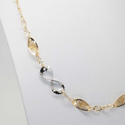 Collana d'oro giallo con due elementi "infinito" in oro bianco