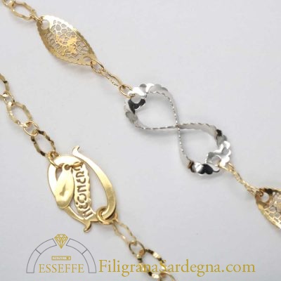 Collana d'oro giallo con due elementi "infinito" in oro bianco