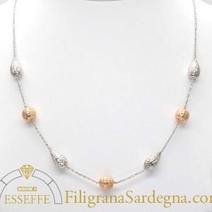 Collana oro bianco con intercalari a goccia e a sfera in oro rosso