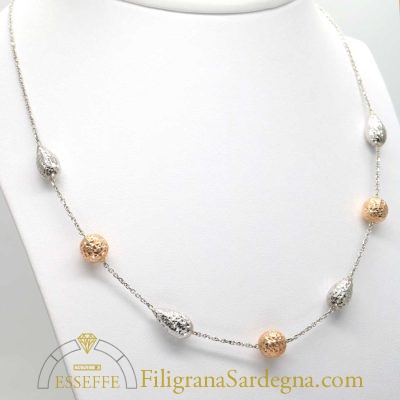 Collana oro bianco con intercalari a goccia e a sfera in oro rosso