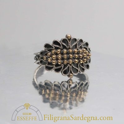 Fede campidanese brunita con grani d’oro