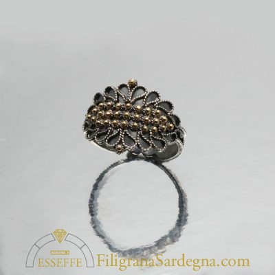 Fede campidanese brunita con grani d’oro