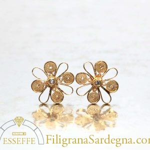 Fiori di filigrana d'oro con diamante