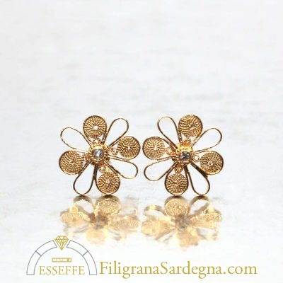 Fiori di filigrana d'oro con diamante