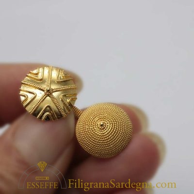 Gemelli in oro con pintadera e corbula